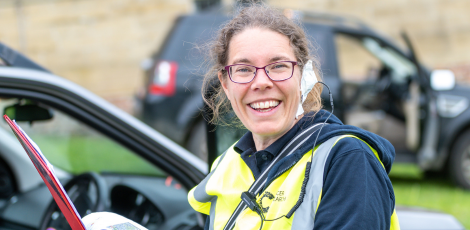 Race for Life volunteer with clipboard